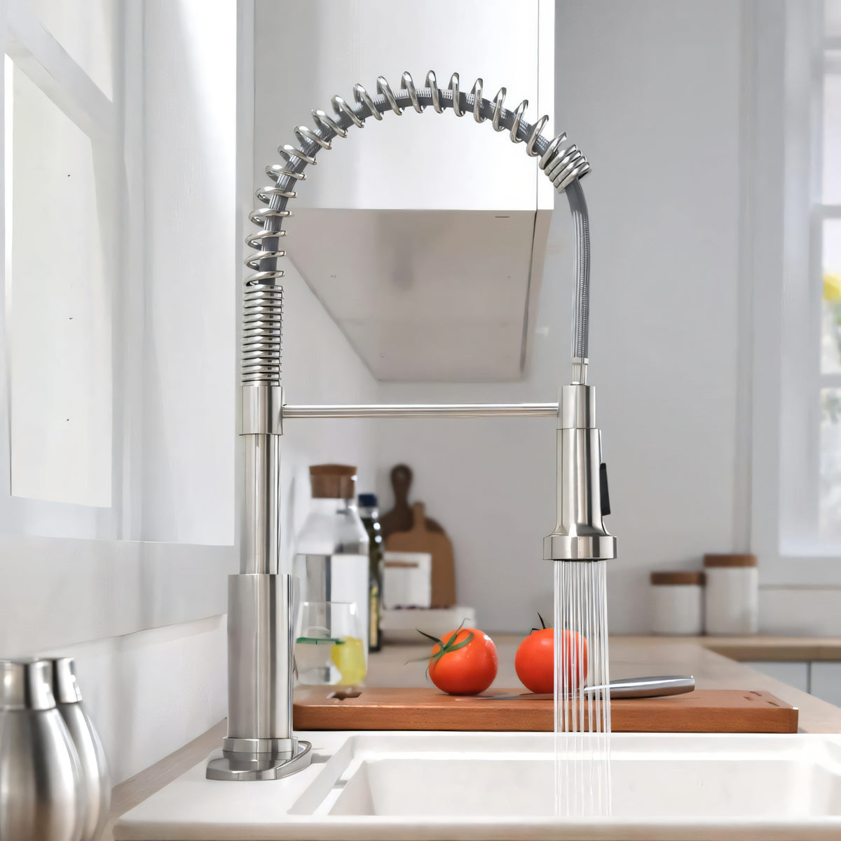 A countertop salad spinner and strainer set shown on a white background, with a beige plastic basket, metal colander interior, vegetables inside, water splashing out, and three round filter discs displayed below.