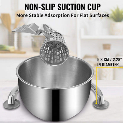 Stainless steel kitchen mixer with non-slip suction cup on a blurred kitchen background