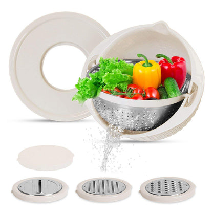A multi-functional vegetable chopper and colander set with a beige plastic container, stainless steel colander basket, three interchangeable cutting discs, and a round lid, shown with fresh vegetables and water dripping out on a white background.